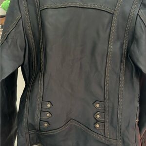 Black jacket 100% sheepskin.